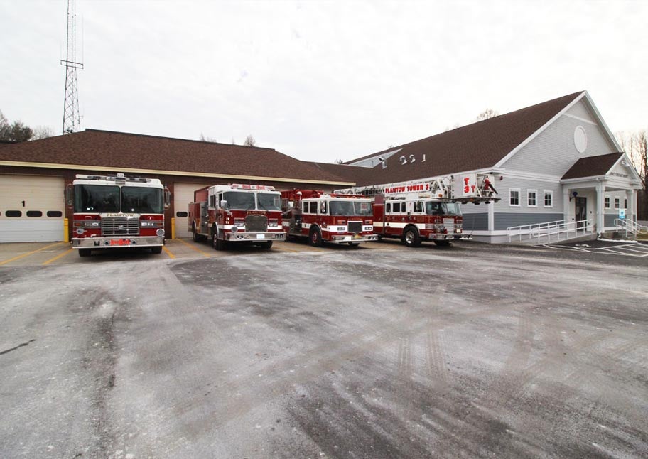 exterior of Plaistow public safety complex with fire trucks lined up