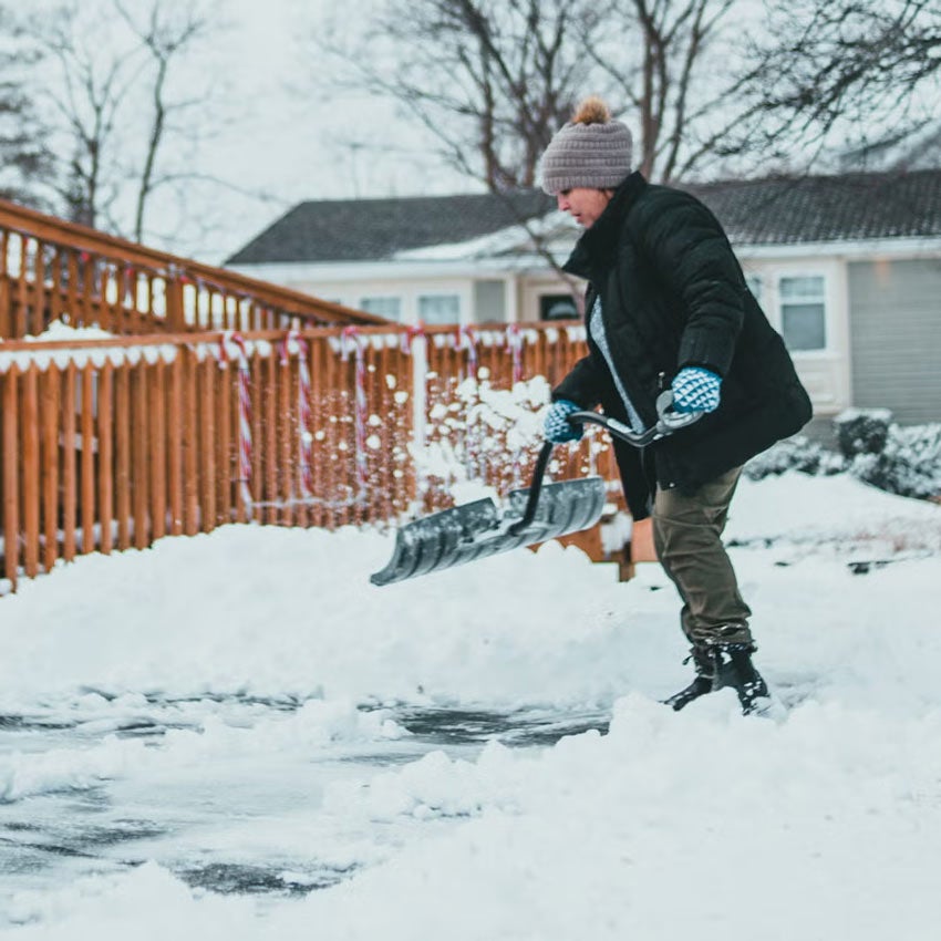 person shoveling snow