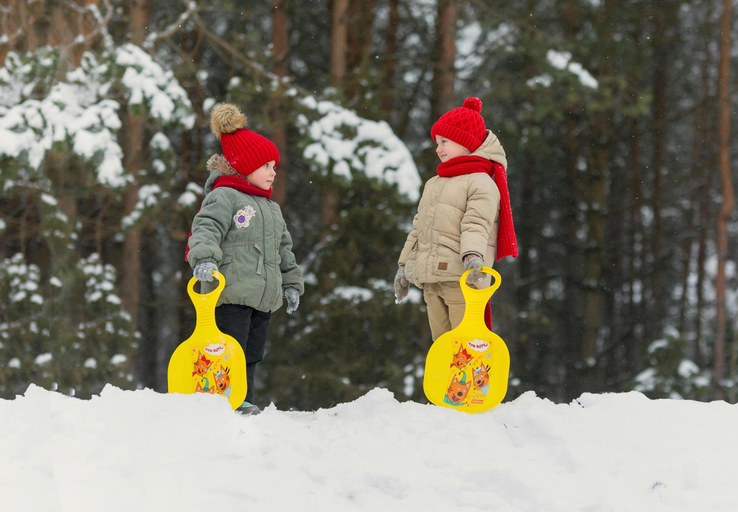 children playing in the snow