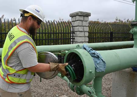 Unitil natural gas crew member working