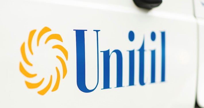 Close up of Unitil logo on side of truck