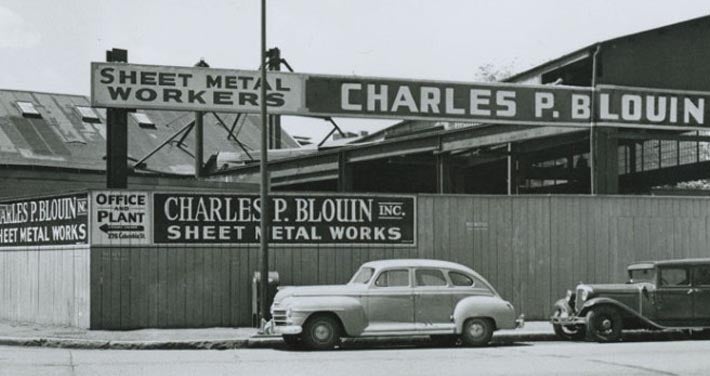 vintage photo of exterior of Charles P. Blouin office and plant
