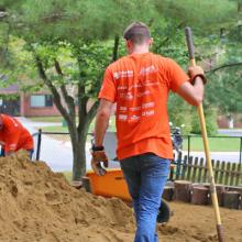 A Unitil employee working outside at the United Way Day of Caring event.