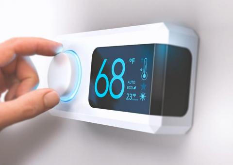 hand dialing smart thermostat