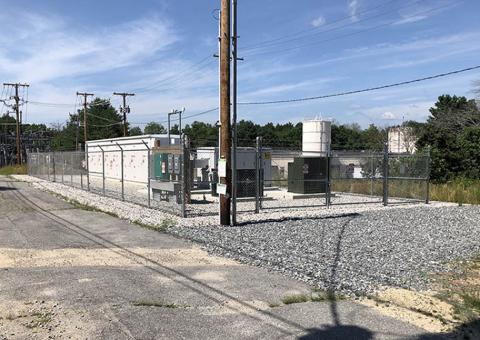 fence enclosed Townsend battery storage facility exterior view