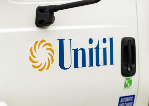 Unitil logo on truck door