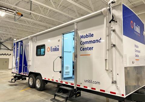 exterior of Unitil's new mobile command center in a large garage